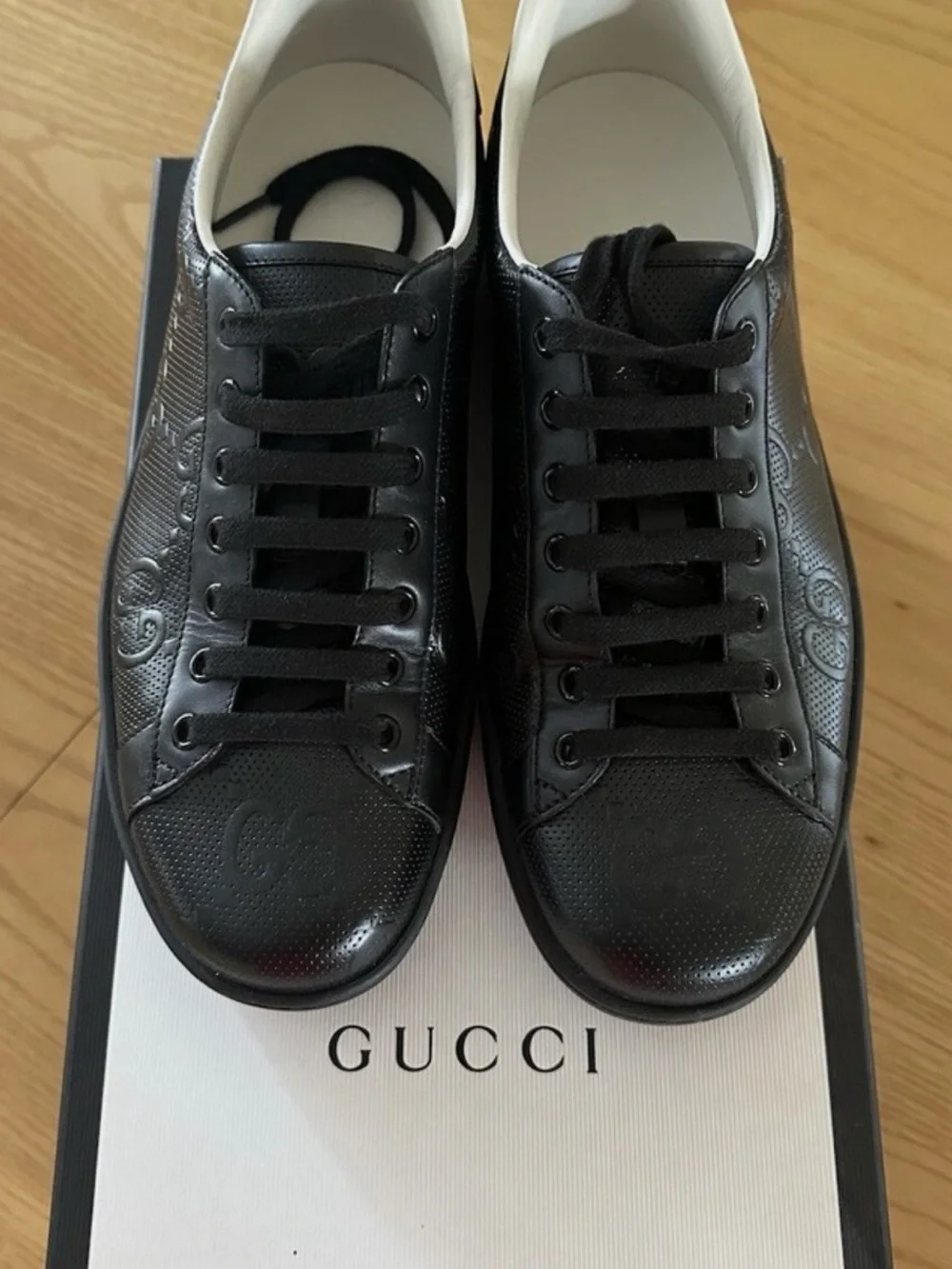 Gucci Black Men's Embossed Leather Sneakers
